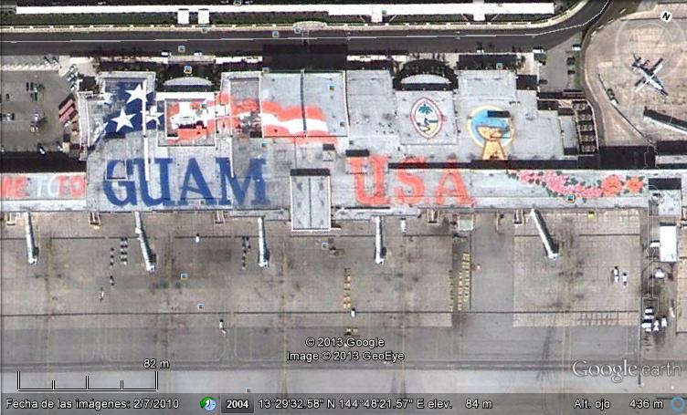 Cartel en el aeropuerto de Guam - Usa 1 - Mensajes al Espacio