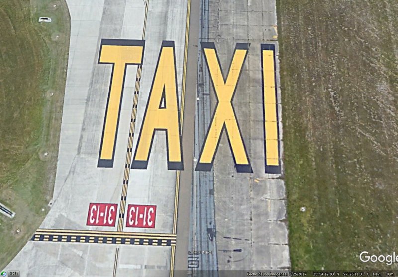 Cartel de Taxi visible desde el espacio 1